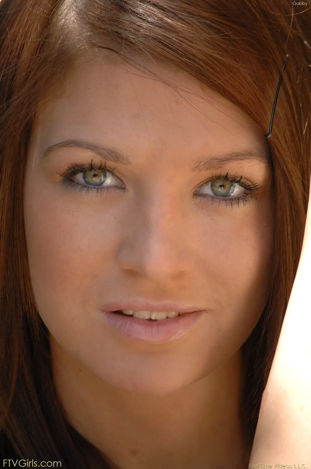 gabby-ftvgirls-green-eyes-closeup Gabby FTVGirls close-up portrait showing her green eyes and brunette hair